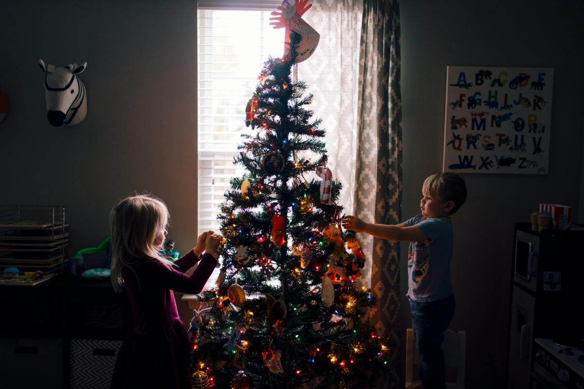 Image of children decorating Christmas Tree